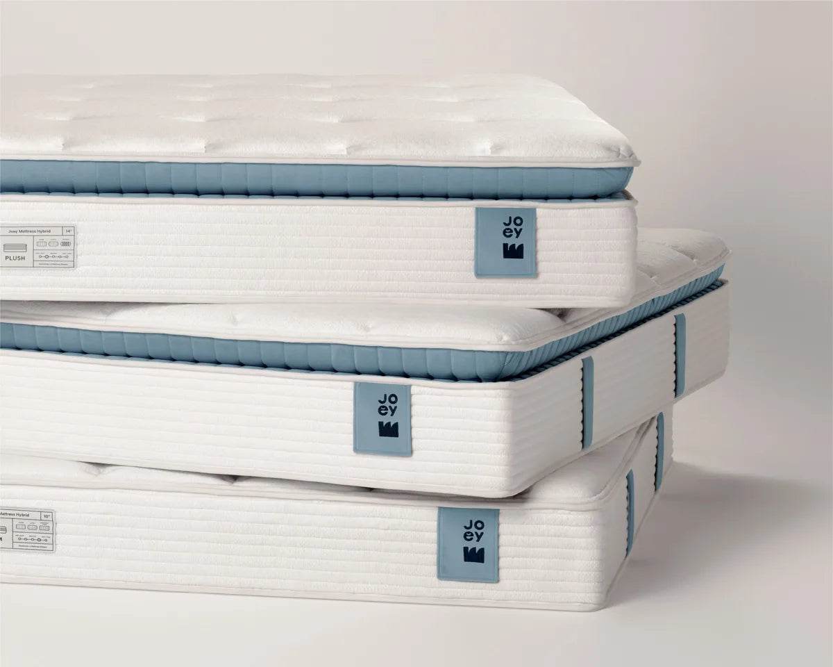 Three Joey Hybrid mattresses with blue trim